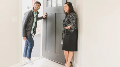Homeowner Showing the Unit to Her Client